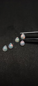 Ópalos Blancos Naturales Etíopes de Alta Luminosidad, Forma de Pera Lisa, Cabujones de 7*9 mm, Oferta al por Mayor a Precio de Mayoreo, Compre Joyería en Línea - Product Image 6