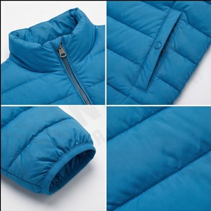 Doudoune d'hiver de couleur unie pour hommes et femmes avec manches imprimées à col montant et fermeture à glissière Mode masculine - Product Image 4