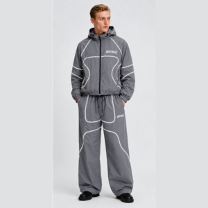 Conjunto deportivo de dos piezas de nailon transpirable, estilo vintage, con chaqueta y pantalones con cordón y cremallera para hombre. - Product Image 5