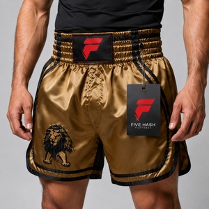 Shorts de Muay Thai haut de gamme, conçus avec un tissu résistant offrant un confort respirant et des mouvements libres pour chaque entraînement. - Product Image 4