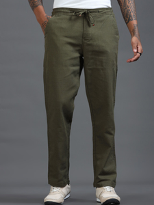 Versatile Green Cotton <b>Trousers</b> For <b>Men</b> Relaxed Mid Rise Regular Pants With Four Pockets And Stretchable <b>Elasticated</b> Waistband - Product Image 1