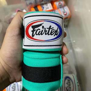 Meilleures bandes de boxe élastiques en coton pour le soutien des poignets, idéales pour le MMA, le Muay Thai, le Kickboxing et l'entraînement en salle de sport - Product Image 1