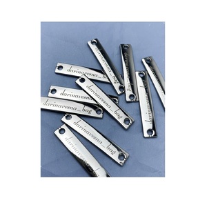 Étiquettes de vêtements, logos de marques en métal, plaques d'étiquettes, métal très demandé pour l'habillement - Product Image 1