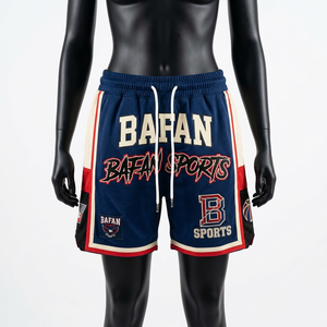 Shorts de basket-ball pour femmes de qualité supérieure, en polyester mesh bleu marine, avec empiècements latéraux contrastés et logo. - Product Image 1