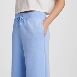 Pantalon de survêtement large bleu clair pour femme, taille mi-haute, avec cordon de serrage, poches latérales, détail de bouton sur le bas, ourlet ouvert - Product Image 5
