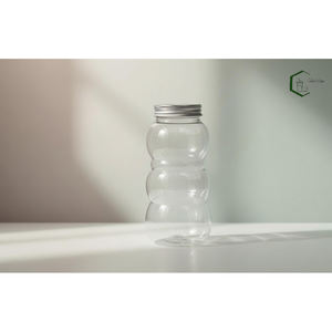 Pot en plastique PET de 500 ml en forme de bonhomme de neige avec couvercle à vis en aluminium, emballage alimentaire OEM pour collations, bonbons, noix, fabriqué au Vietnam - Product Image 5