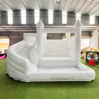 Château gonflable de luxe blanc pour mariage avec toboggan pour mariages, réceptions et célébrations