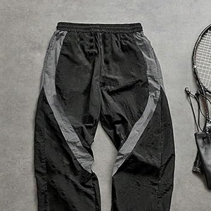 กางเกงกันลมไนลอนสำหรับผู้ชายกางเกงวิ่งออกกำลังกายแบบผูกเชือกเอวยางยืดกางเกงลำลองป้องกันรอยยับออกแบบโลโก้ได้ตามต้องการ - Product Image 4