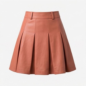 Jupe mini plissée en similicuir taille haute pour femme, couleur unie, style brillant, toutes saisons - Product Image 1