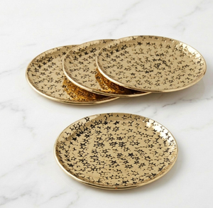 Juego de posavasos circulares de latón pulido con un diseño de mini estrellas grabadas en toda la superficie, disponible a precios de mayorista. - Product Image 1