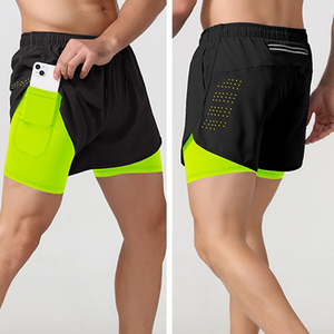 Shorts de compression pour homme, couleur unie, avec poches, séchage rapide, taille élastique, longueur mi-cuisse, en spandex et polyester, design tricoté - Product Image 4