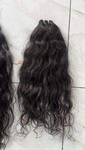 Paquete de extensión de trama de cabello humano crudo indio atado a mano de calidad premium de lujo sin procesar con textura ondulada en venta - Product Image 4