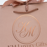 Sac cadeau en papier de luxe avec logo personnalisé en feuille d'or rose, sac d'emballage pour le shopping rose poudré crème avec nœud en ruban