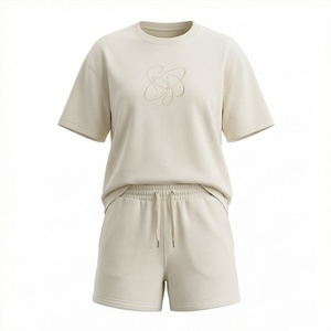 Ensemble décontracté 2 pièces en coton tricoté pour femme : T-shirt à col rond et manches courtes brodé, couleur unie, coupe ample, au-dessus du genou - Product Image 1