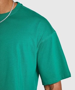 เสื้อยืดโอเวอร์ไซส์ทรงครอปสำหรับผู้ชาย สีเขียว แขนสั้น คอกลม สีพื้น ผ้าเจอร์ซีย์ถัก ระบายอากาศได้ดี ใส่สบาย - Product Image 5