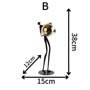 Escultura moderna de figura humana sosteniendo bolas doradas, pieza decorativa para exhibir en estanterías, mesas auxiliares y el interior de la oficina. - Product Image 6