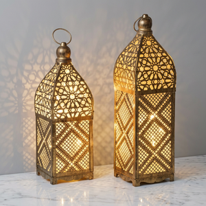 Illuminated <b>Moroccan</b> <b>Lantern</b> Featuring Ornamental Cutwork Metal Design for Sophisticated Ramadan and Wedding Decoration - Product Image 1