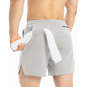 Shorts de sport pour hommes en polyester uni, personnalisables en gros, OEM, haute qualité, avec cordon de serrage à la taille et poches latérales, séchage rapide - Product Image 2