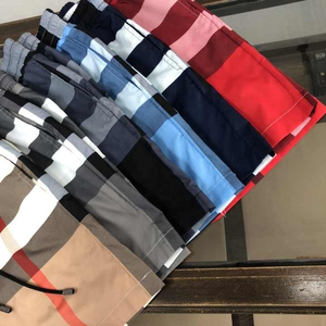 Nouveaux shorts de plage amples pour hommes, grande taille, personnalisables avec logo de designer, en toile unie, séchage rapide, respirants, imperméables et anti-UV - Product Image 6