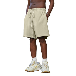Pantalones cortos tipo bermuda de algodón de color liso para hombre con cordón en la cintura y bolsillos estilo casual - Product Image 1