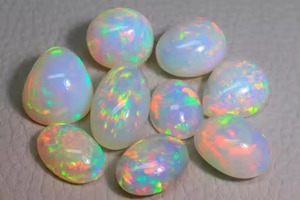 โอปอลไฟเอธิโอเปียแท้ทรงหลังเบี้ย สีขาว  รับรองโดยผู้ตรวจสอบอิสระ น้ำหนัก 5-8 กะรัต สำหรับทำเครื่องประดับ - Product Image 6