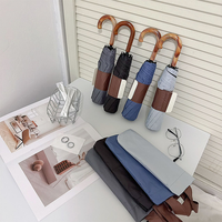 Parapluie compact pliable en 3 sections, avec poignée en bois courbée rétro, protection UPF50, double usage soleil/pluie, 8 baleines, revêtement noir, pour femme, marque OEM
