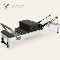 Vente en gros de Reformer Pilates OEM/ODM en cuir microfibre avec cadre en alliage d'aluminium, machine de yoga Pilates pour studios de prestige
