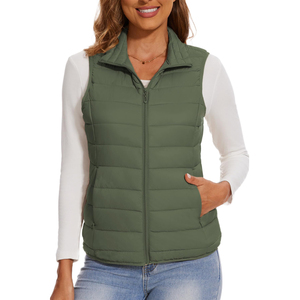 Chaleco acolchado de invierno para mujer con relleno ligero, tela resistente y corte moderno, ideal para viajes, senderismo y uso diario. - Product Image 1