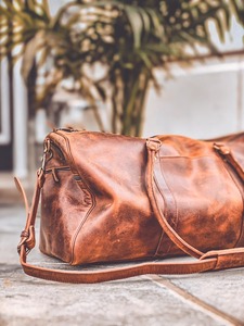 กระเป๋าหนังวัวแท้แบบดัฟเฟิล สำหรับเดินทาง ท่องเที่ยวสุดสัปดาห์ น้ำหนักเบา พกพาสะดวก สไตล์วินเทจ แฟชั่น ซิป จุของได้เยอะ - Product Image 3