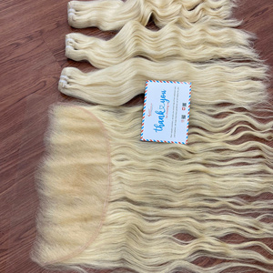 ¡MÁS VENDIDO! Extensiones de cabello humano vietnamita 100% natural, color rubio, precio al por mayor, cabello virgen, extensiones de cabello en trama con ondas naturales. - Product Image 1