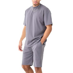 Ensemble court d'été respirant pour homme avec logo personnalisé de haute qualité / Nouveau design, ensemble deux pièces de couleur unie, toutes tailles - Product Image 1