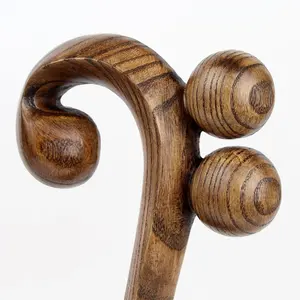 Ornement musical TW en bois foncé sculpté, avec un motif de cœur et de note entrelacés, pour la décoration esthétique d'un studio à domicile. - Product Image 2