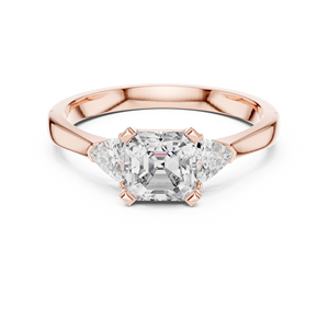 แหวนเพชรทรงเหลี่ยมแปดเหลี่ยมทองคำโรสโกลด์ 14k เพชรเพาะเลี้ยงในห้องปฏิบัติการ มาพร้อมดีไซน์แบบสามเม็ดสำหรับงานหมั้นและวันครบรอบ - Product Image 1