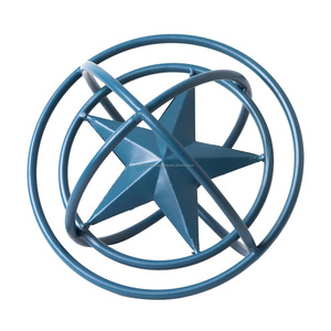 Sphère décorative en métal poli, sculpture de table avec étoile bleue et motif circulaire - Product Image 1