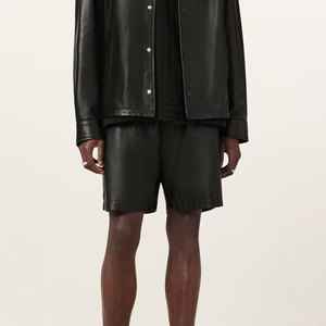 กางเกงขาสั้นหนังผูกเชือกเอวสูงสำหรับผู้ชาย กางเกงขาสั้นหนัง PU แฟชั่น กางเกงขาสั้นหนังแท้สำหรับผู้ชายสไตล์นักขี่มอเตอร์ไซค์ - Product Image 1