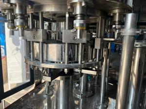 Máquina Automática de Llenado de Bebidas con PLC Eléctrico de 40 BPM para Agua Pura y Botellas de 200 ml - Product Image 6