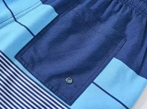 กางเกงขาสั้นผู้ชายคุณภาพสูงขายส่ง 100% โพลีเอสเตอร์ สไตล์สตรีทแวร์ลำลอง เอวกลาง เหมาะสำหรับออกกำลังกาย ฟิตเนส และว่ายน้ำ ดีไซน์ลายพิมพ์สีพื้นสุดฮิต - Product Image 5