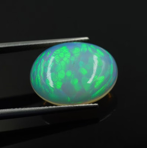 Ethiopian <b>Honey</b> Comb Opal Gemstone: 6.20ct Oval Cabochon for Jewelry - Product Image 1