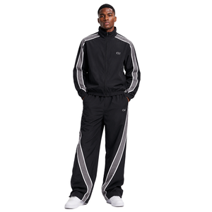 Trendy <b>Nylon</b> Waterproof Jogging Suit Custom Reflective Side Stripes Unisex Baggy Zip Up <b>Track</b> Jacket and <b>Pants</b> Windbreaker Set - Product Image 1