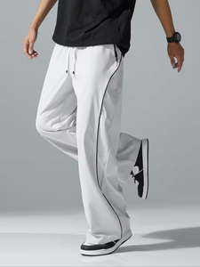 Pantalon de jogging décontracté pour homme, coupe ample et élastique, style urbain, léger en polyester, avec bandes latérales, poches et cordon de serrage - Product Image 3