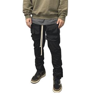 กางเกงจ็อกเกอร์ทรงสลิมฟิตผ้าโพลีเอสเตอร์แบบมีเชือกผูกข้าง ลายทางด้านข้าง ไม่มีลายพิมพ์ สำหรับผู้ชาย มีกระเป๋าข้าง - Product Image 1