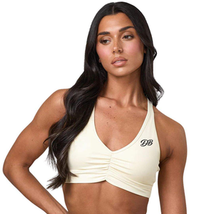 Sujetador deportivo con logo personalizado, cuello en V fruncido, de alto soporte y acolchado para mujer, top corto para gimnasio, fitness y ropa deportiva al por mayor. - Product Image 1