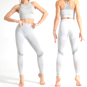 Conjunto de yoga sin costuras de 2 piezas para mujer: leggings de cintura alta y top corto con cuello redondo y tirantes cruzados, elástico en cuatro direcciones y transpirable. - Product Image 1