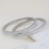 Bracelets de luxe en or rose et moissanite pour femmes, ornés de pierres étincelantes, pour un style quotidien, disponibles à la vente par un exportateur indien.