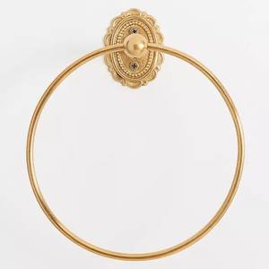 Porte-serviette mural rond en laiton doré de luxe moderne pour une salle de bain élégante - Product Image 1