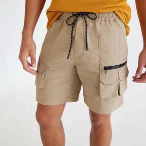 กางเกงวินด์เบรกเกอร์สีเทา น้ำหนักเบา เป็นมิตรกับสิ่งแวดล้อม กันน้ำ พิมพ์ลายแบบ Sublimation ทั้งตัว ผลิตจากโพลีเอสเตอร์ สำหรับออกกำลังกาย รับผลิตแบบ OEM - Product Image 1