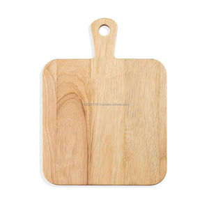 Tabla de cortar de madera que ofrece atractivos tonos de color madera que añaden un encanto natural y cálido a cualquier configuración de cocina. - Product Image 1