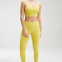 Set Yoga 2 Potong Wanita Grosir Kustom OEM, Bra Olahraga Tanpa Jahitan Pinggang Tinggi, Celana Pinggang Elastis Bahan Spandex Nylon Bernapas