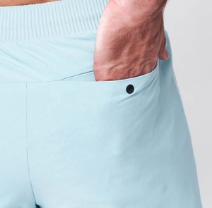 Shorts de course haute performance à séchage rapide, respirants, athlétiques, bleu clair, avec poches, OEM ODM, pour l'entraînement - Product Image 5