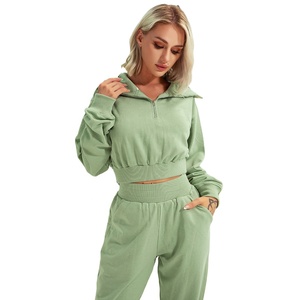 Conjunto de dos piezas formado por top y pantalón para correr, cuello elegante, media cremallera, gran oferta - Product Image 1